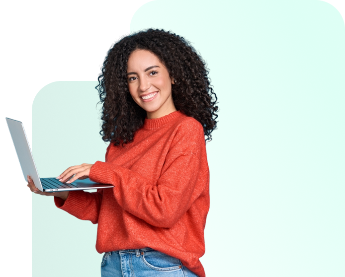 Smiling person using a laptop