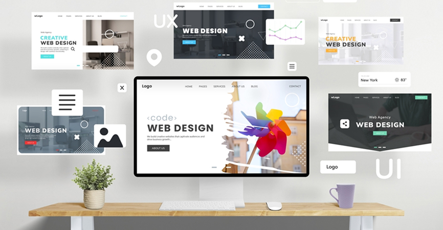 Computer displaying various web design mockups.